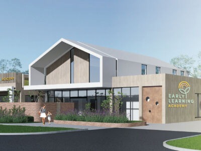 Modern childcare centre with outdoor play areas and welcoming architecture, representing the importance of selecting the right location for long-term success in childcare developments.