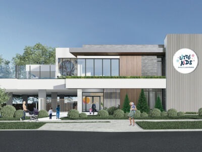 Modern childcare centre exterior with bright, welcoming design and landscaped play areas, representing the importance of securing timely development approvals to protect investment opportunities in high-demand locations.