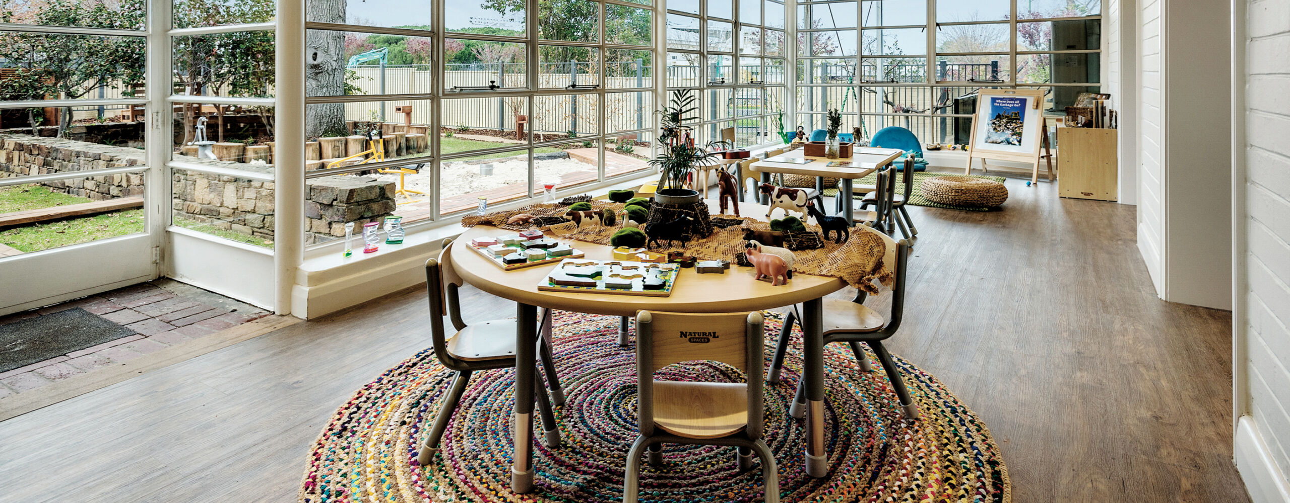 Professional image of a modern Australian childcare centre building, symbolising childcare as a premium social infrastructure asset class. The article explores why childcare property continues to outperform, highlighting long-term triple net leases, fixed or CPI-linked rent escalations, and income security supported by the Australian Government’s Child Care Subsidy. It outlines key investment fundamentals including lease strength, operator quality, and non-discretionary demand, while emphasising strategic execution through demographic analysis, competitor assessment, site selection near schools and major supermarkets, and careful operator due diligence. The content also addresses oversupply risk and the importance of feasibility studies, positioning Mollard Property Group as a specialist partner in data-driven site acquisition, compliant centre design, and strategic lease structuring for sustained, premium returns.