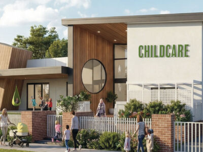Modern purpose-built childcare centre in a high-growth Australian suburb, featuring contemporary architecture, secure entry, large windows for natural light, and landscaped outdoor play areas designed for early learning and safe child development.