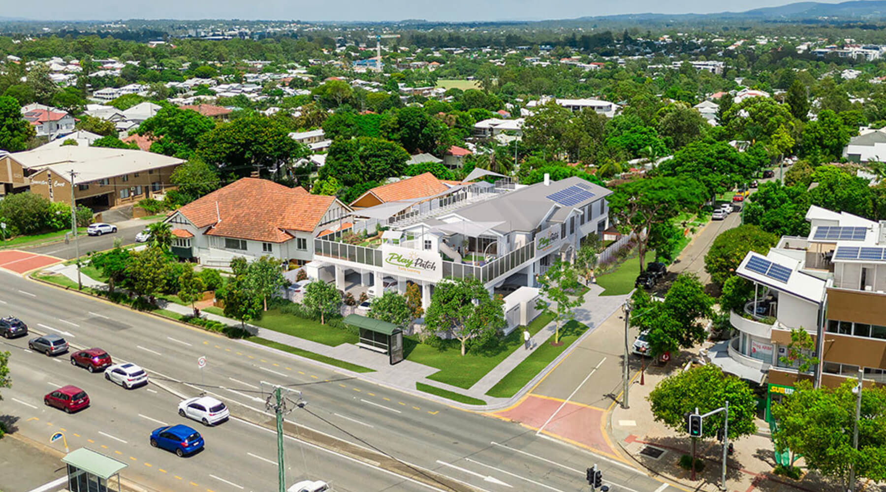 Wide aerial rendering of Play Patch Early Learning in Annerley within the surrounding suburban neighbourhood.