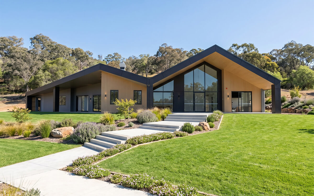 Completed CECS Cowra Early Childhood Centre showcasing the modern timber and black-clad façade.