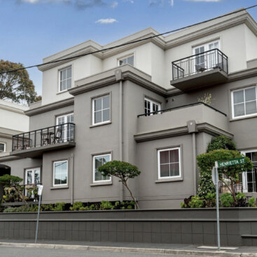 Exterior view of Henrietta Street, Hawthorne apartment development showcasing modern architecture and landscaped frontage.