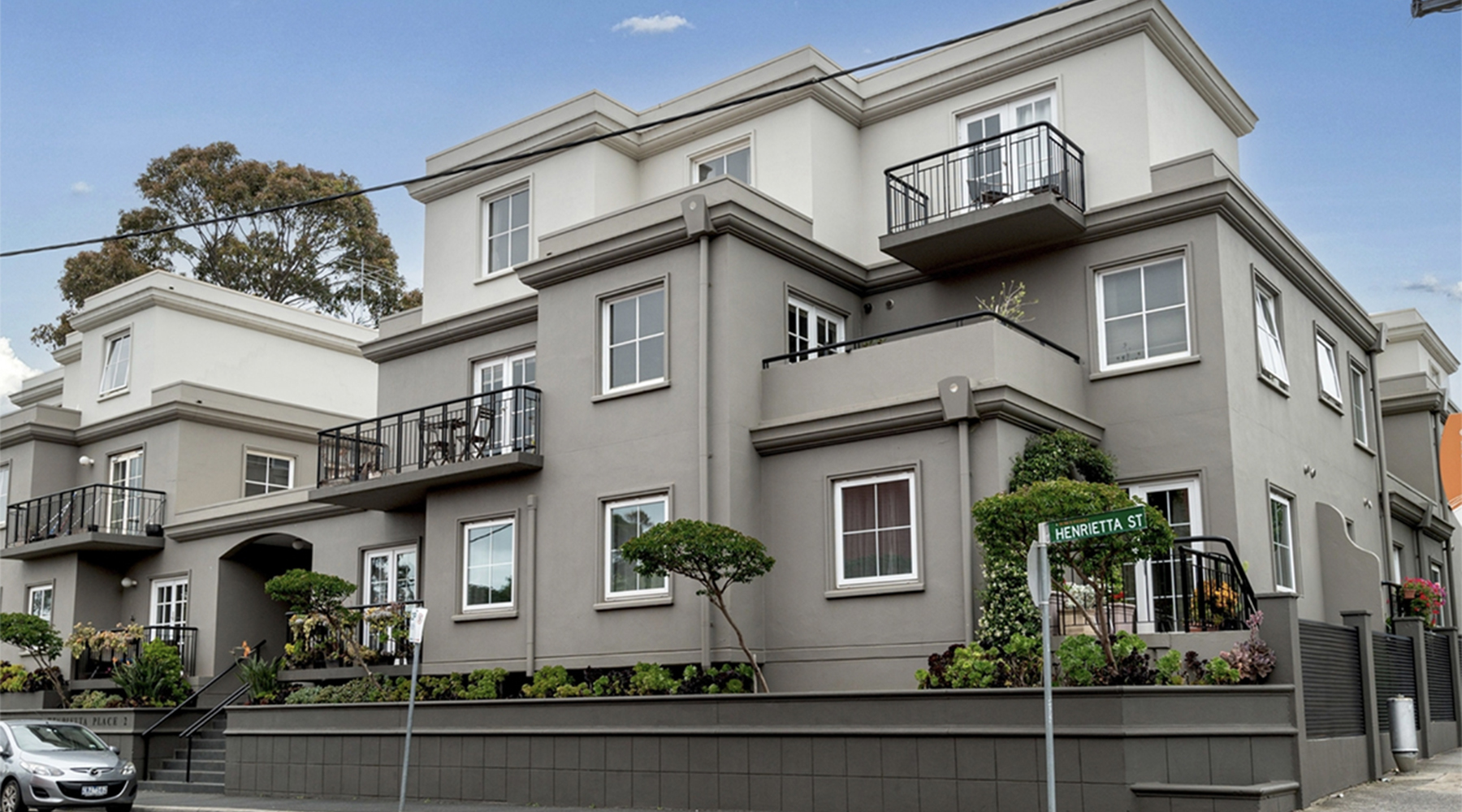 Street view of the Henrietta Street, Hawthorne apartment development with contemporary design and balconies.