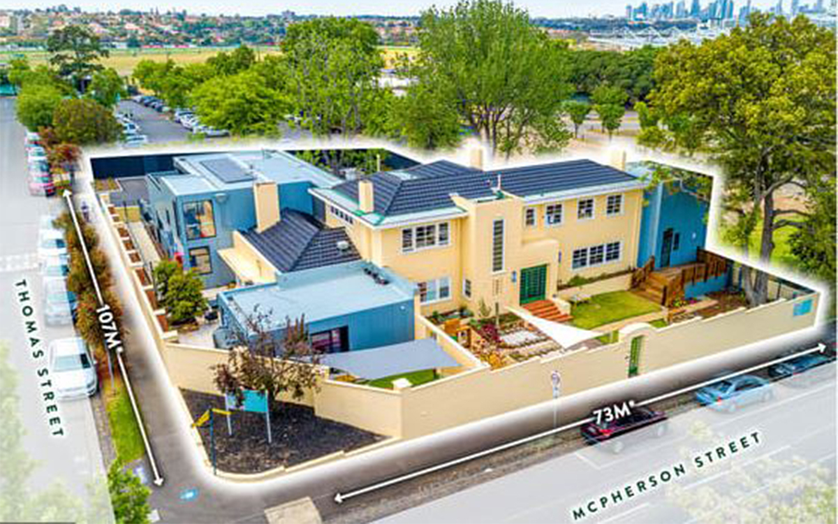 Aerial view of the childcare centre site showing surrounding streets, landscaping and adjacent buildings.