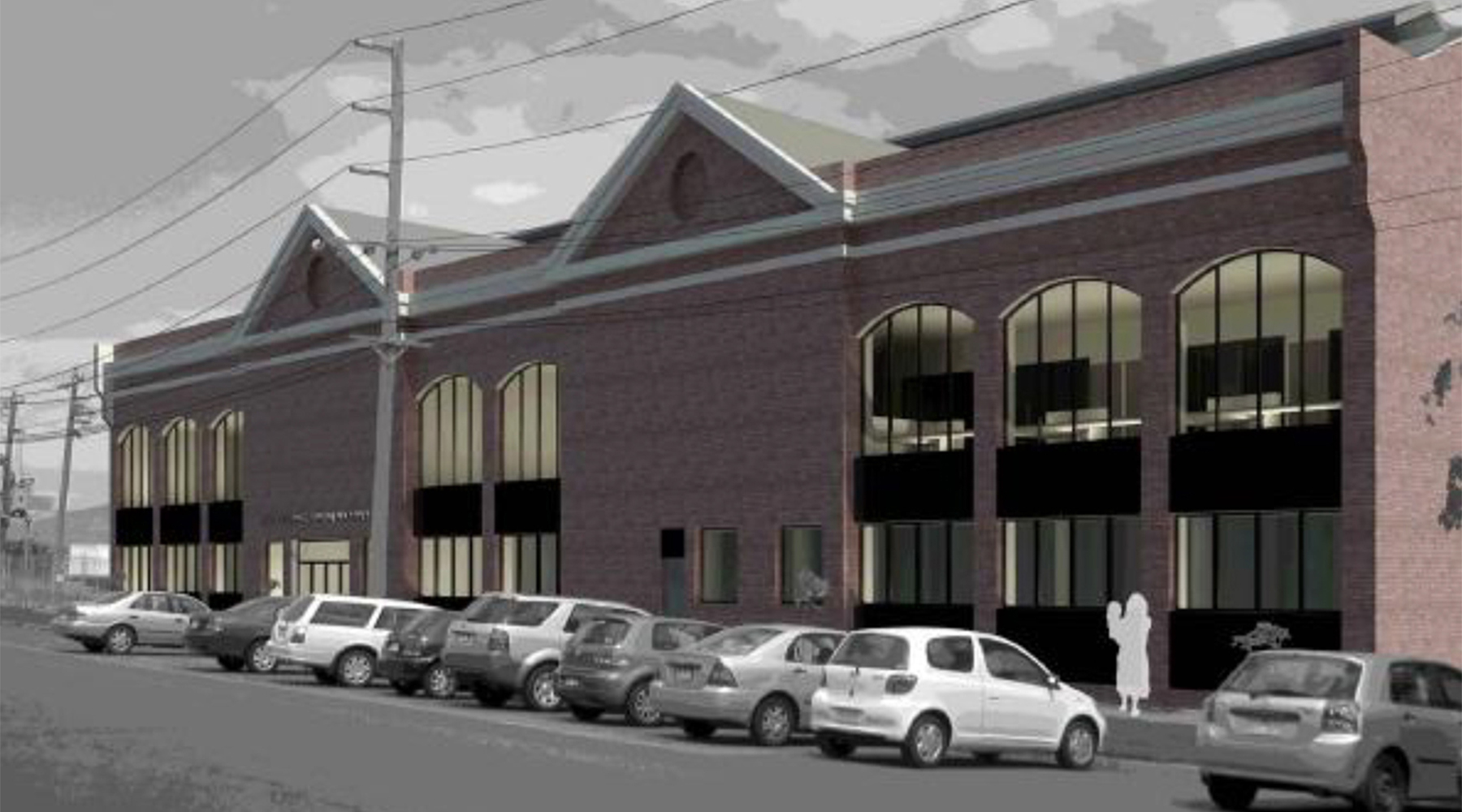 Perspective view of a commercial building with arched windows and street frontage in South Melbourne.