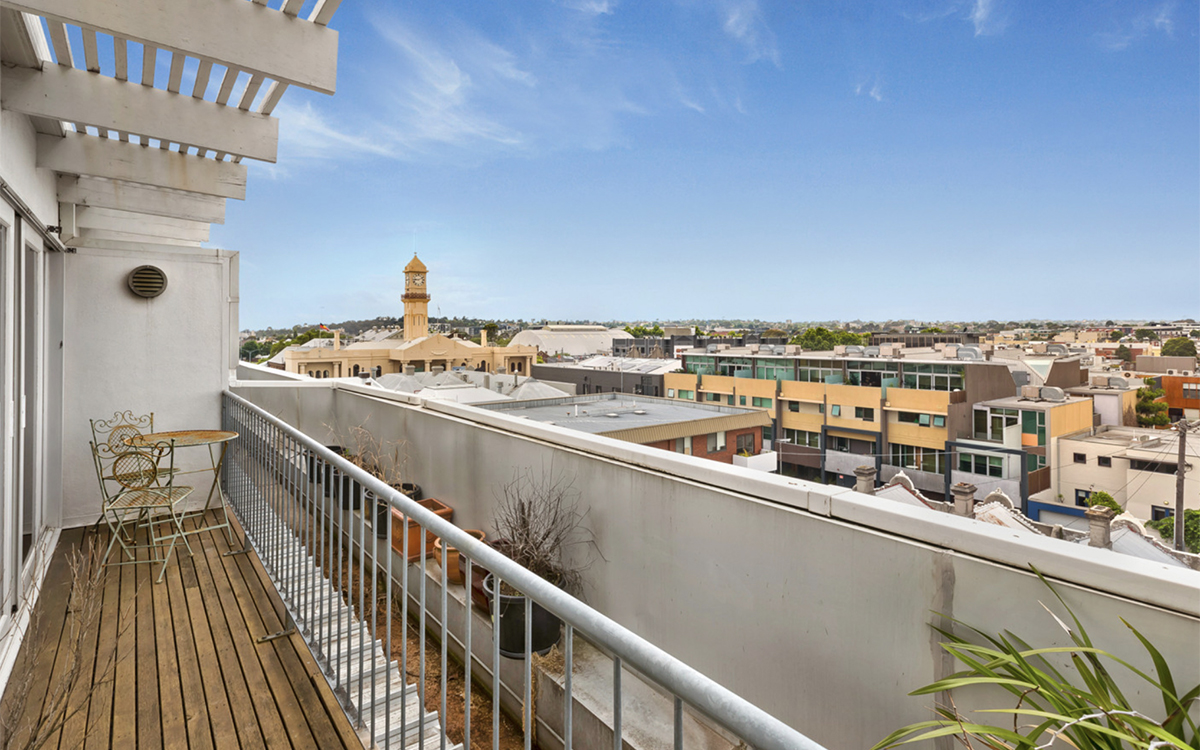 Rooftop balcony at Tullo Place overlooking the surrounding neighbourhood and city skyline.